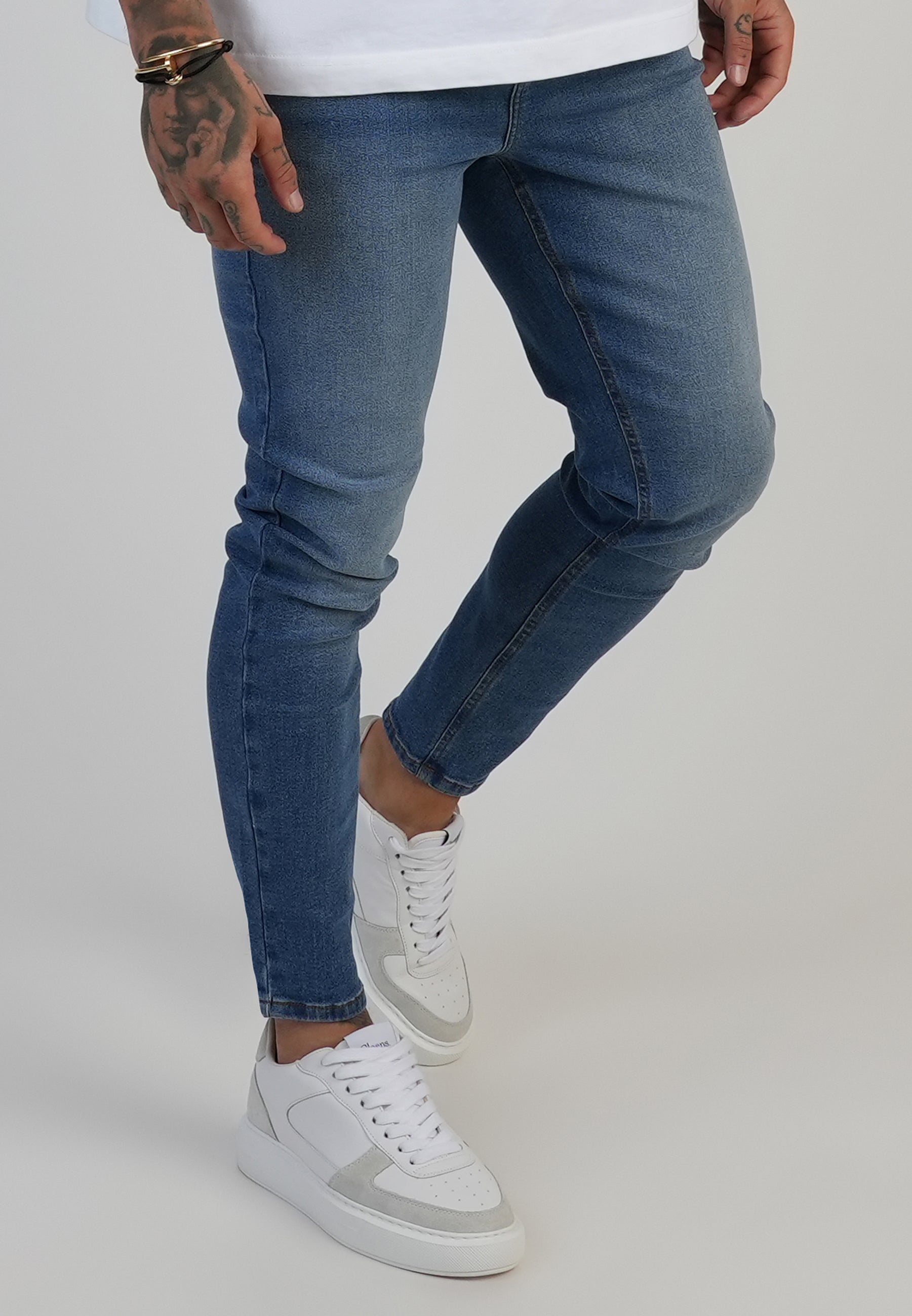 Skinny Jeans in Washed Mid Blue Jeans SikSilk