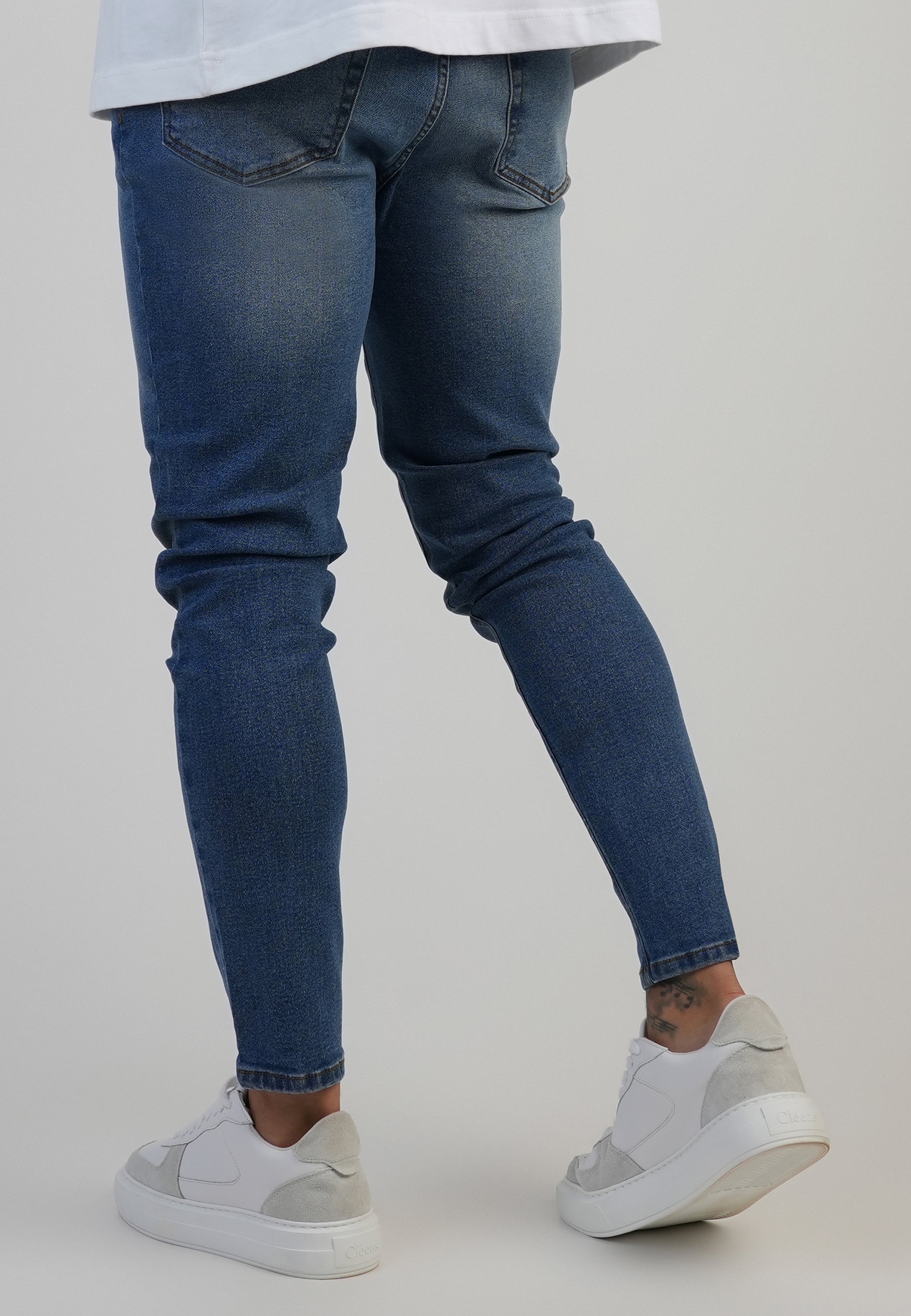 Skinny Jeans in Washed Mid Blue Jeans SikSilk